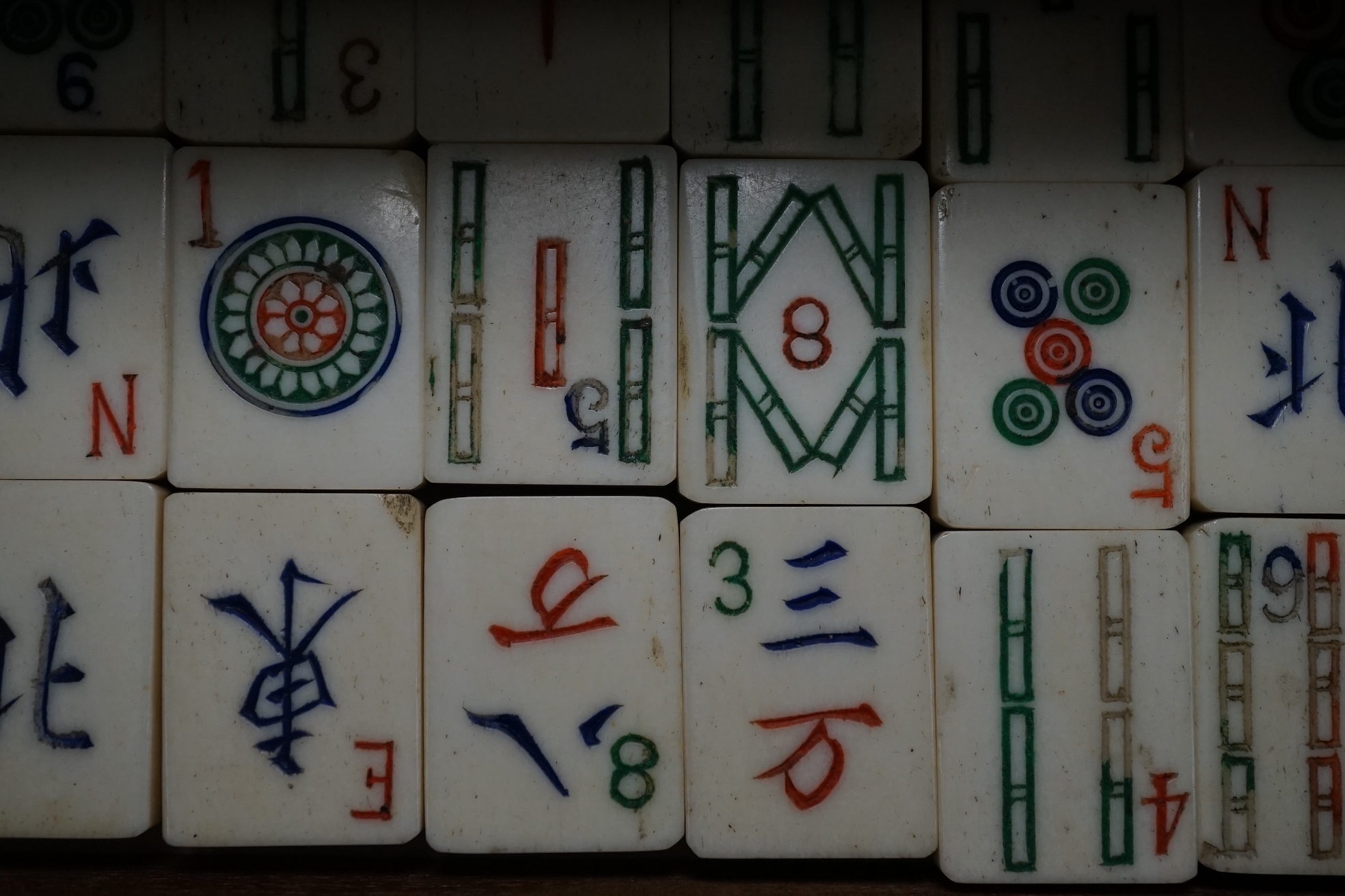 A Chinese boxed bone Mah jong set with five drawers, 19cm high. Condition - poor to fair, case damaged